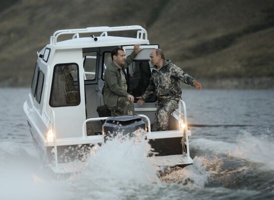 Vladimir Putin and Dmitry Medvedev on holiday