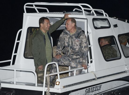 Vladimir Putin and Dmitry Medvedev on holiday