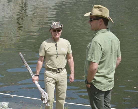 Vladimir Putin and Dmitry Medvedev on holiday