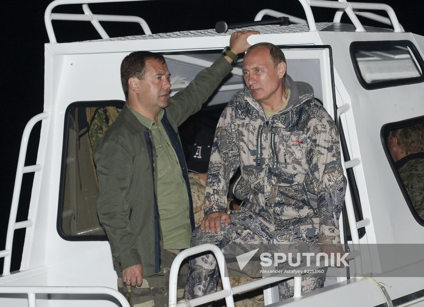 Vladimir Putin and Dmitry Medvedev on holiday