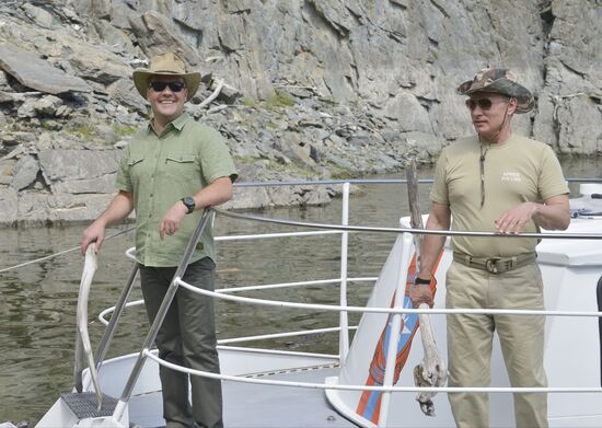 Vladimir Putin and Dmitry Medvedev on holiday