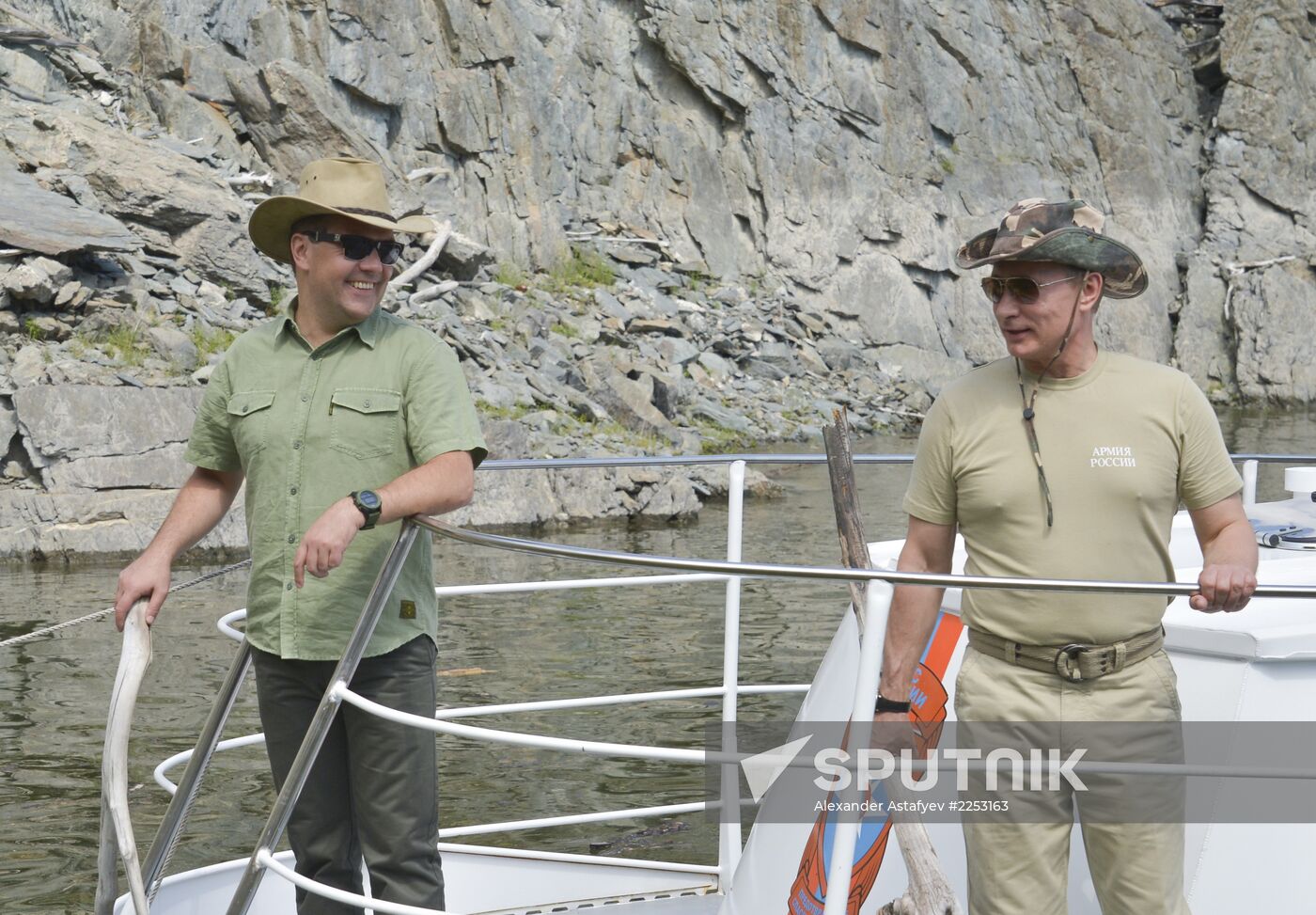 Vladimir Putin and Dmitry Medvedev on holiday