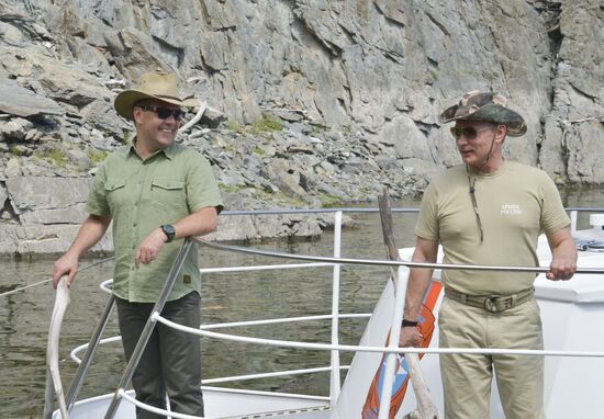 Vladimir Putin and Dmitry Medvedev on holiday