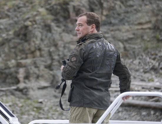 Vladimir Putin and Dmitry Medvedev on holiday
