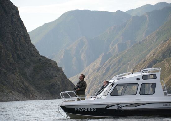 Vladimir Putin and Dmitry Medvedev on holiday