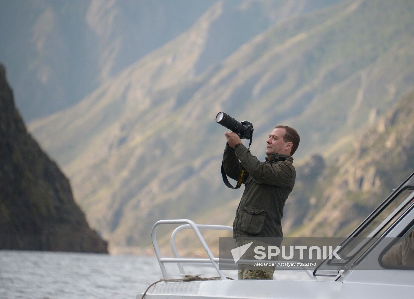 Vladimir Putin and Dmitry Medvedev on holiday