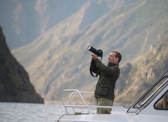 Vladimir Putin and Dmitry Medvedev on holiday