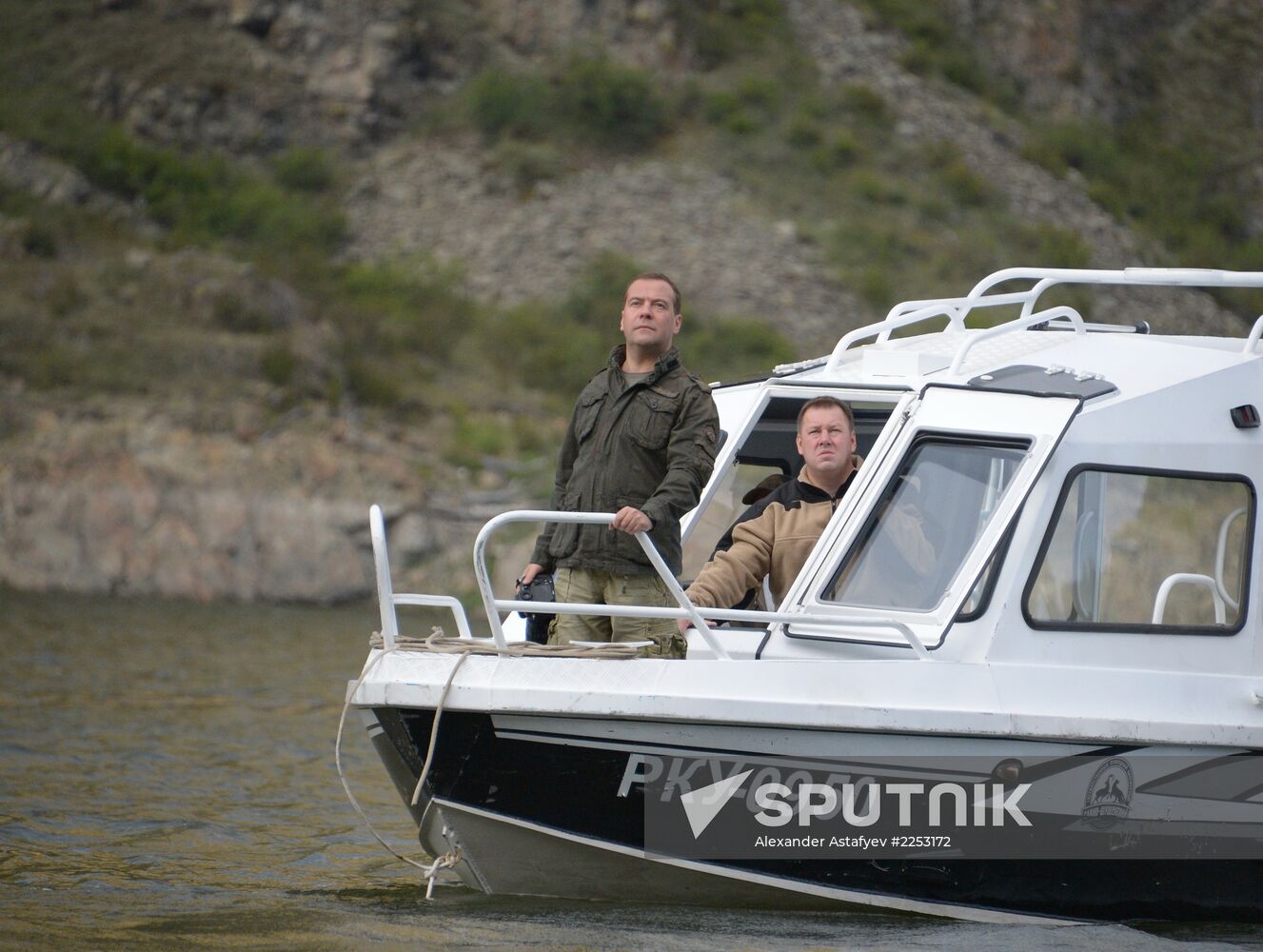 Vladimir Putin and Dmitry Medvedev on holiday