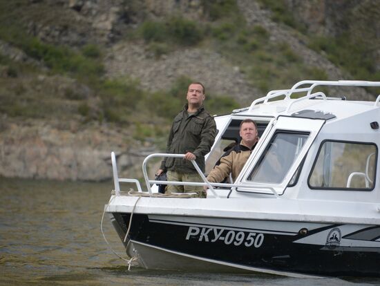 Vladimir Putin and Dmitry Medvedev on holiday