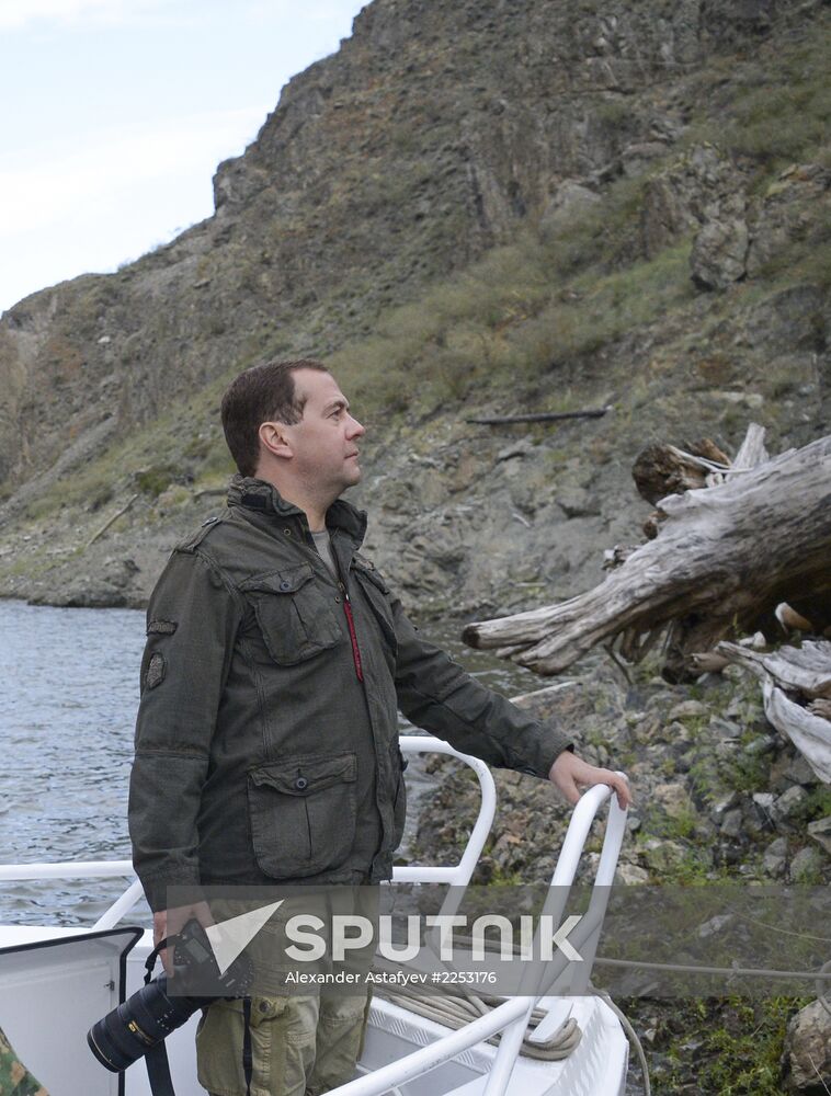 Vladimir Putin and Dmitry Medvedev on holiday