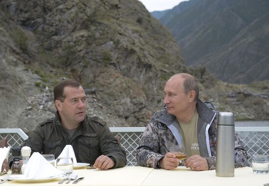 Vladimir Putin and Dmitry Medvedev on holiday