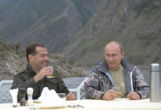 Vladimir Putin and Dmitry Medvedev on holiday