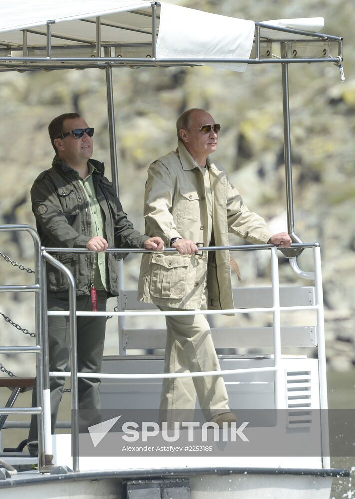 Vladimir Putin and Dmitry Medvedev on holiday