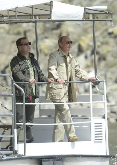Vladimir Putin and Dmitry Medvedev on holiday