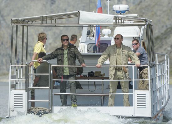 Vladimir Putin and Dmitry Medvedev on holiday