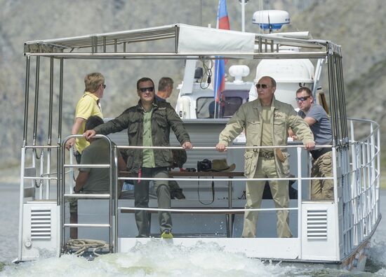 Vladimir Putin and Dmitry Medvedev on holiday