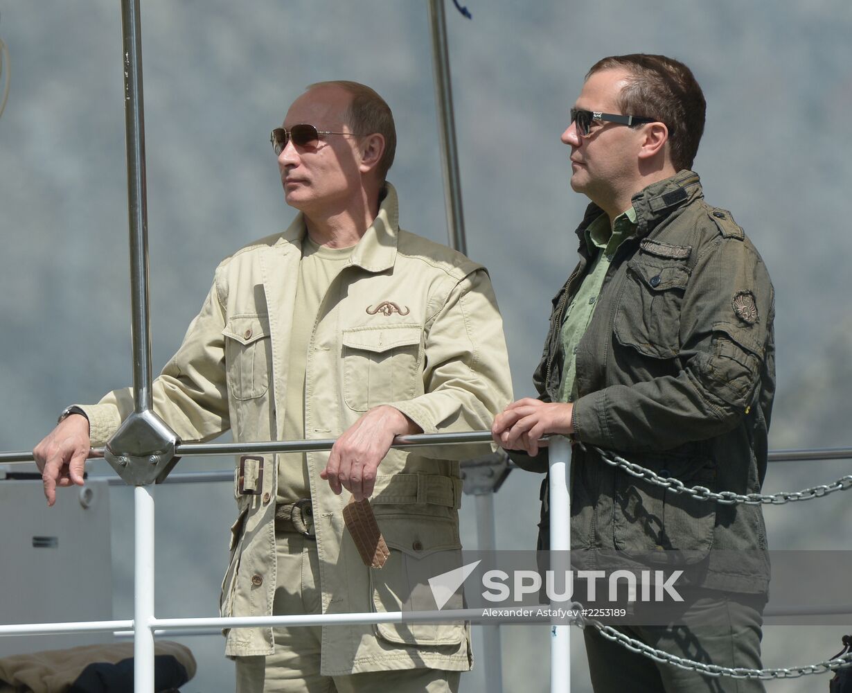 Vladimir Putin and Dmitry Medvedev on holiday
