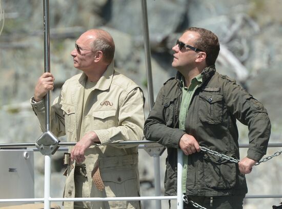 Vladimir Putin and Dmitry Medvedev on holiday