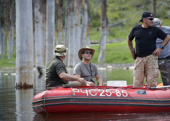 Vladimir Putin and Dmitry Medvedev on holiday