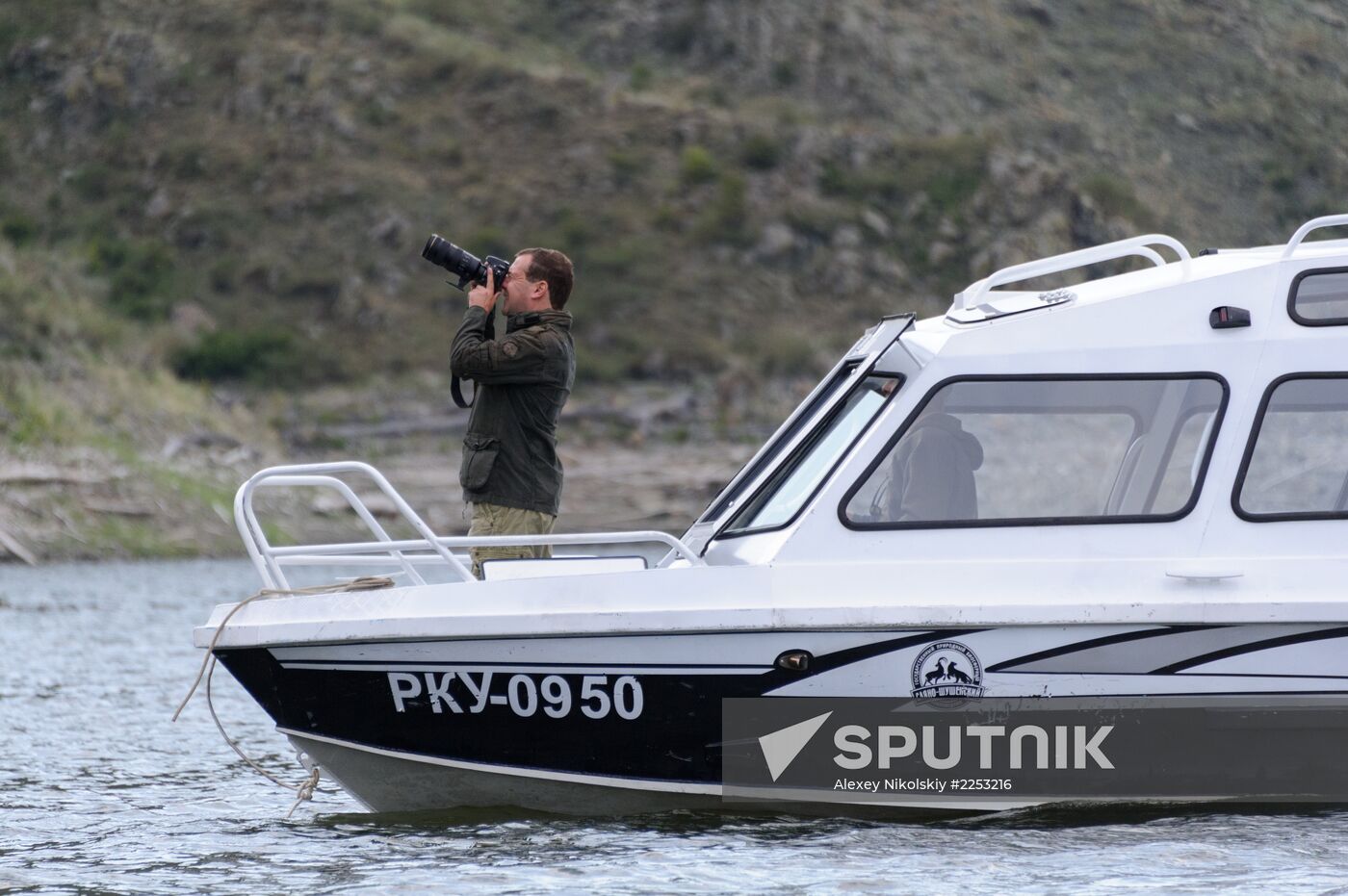 Vladimir Putin and Dmitry Medvedev on holiday