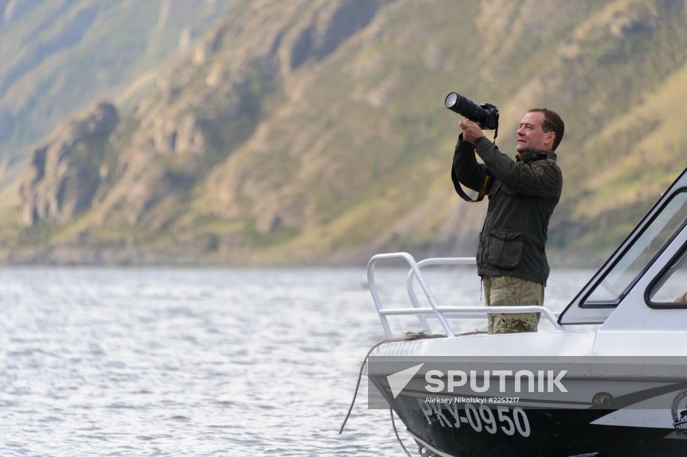 Vladimir Putin and Dmitry Medvedev on holiday