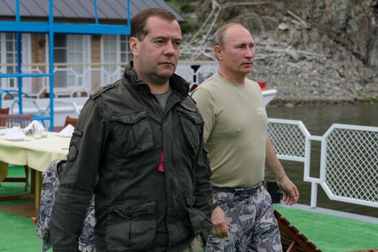 Vladimir Putin and Dmitry Medvedev on holiday