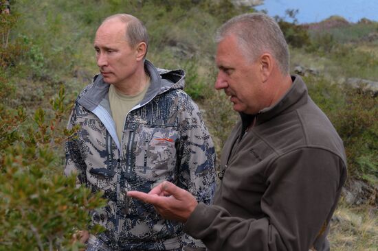 Vladimir Putin and Dmitry Medvedev on holiday