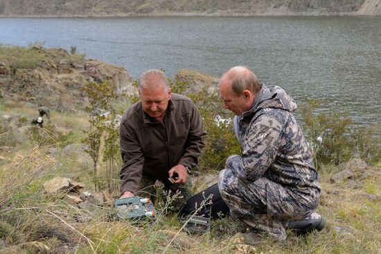 Vladimir Putin and Dmitry Medvedev on holiday