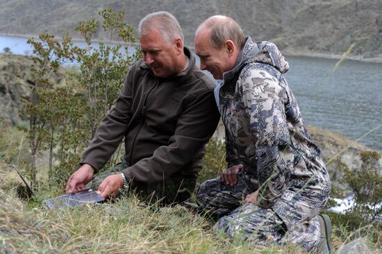 Vladimir Putin and Dmitry Medvedev on holiday