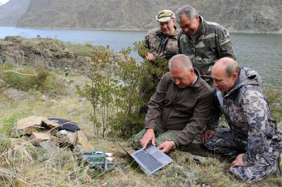 Vladimir Putin and Dmitry Medvedev on holiday