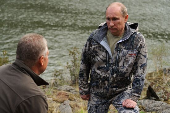 Vladimir Putin and Dmitry Medvedev on holiday