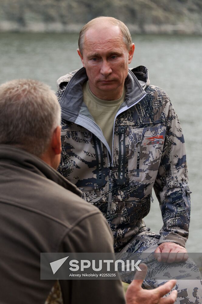 Vladimir Putin and Dmitry Medvedev on holiday