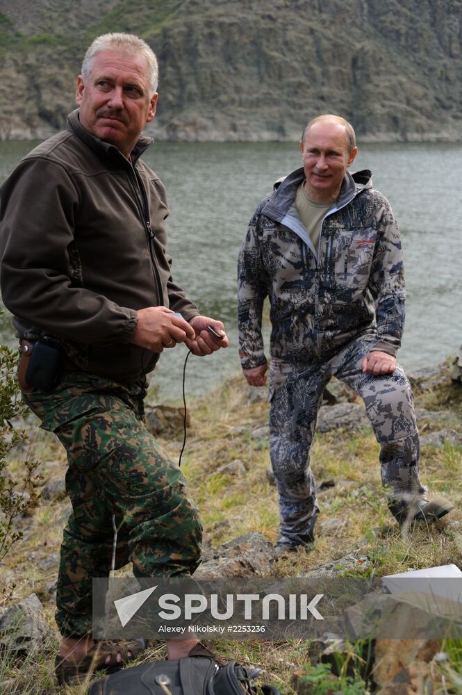 Vladimir Putin and Dmitry Medvedev on holiday