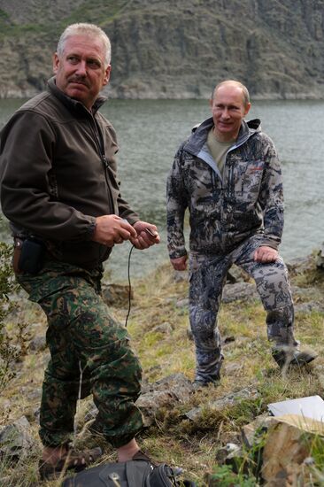 Vladimir Putin and Dmitry Medvedev on holiday