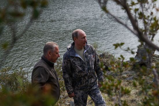 Vladimir Putin and Dmitry Medvedev on holiday