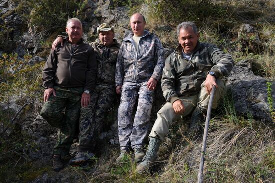 Vladimir Putin and Dmitry Medvedev on holiday