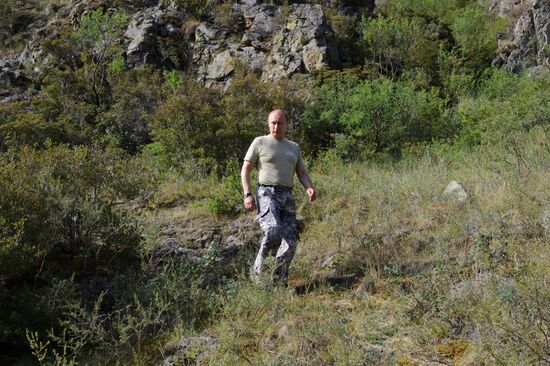 Vladimir Putin and Dmitry Medvedev on holiday