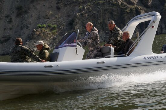 Vladimir Putin and Dmitry Medvedev on holiday