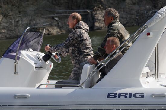 Vladimir Putin and Dmitry Medvedev on holiday