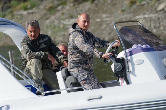 Vladimir Putin and Dmitry Medvedev on holiday