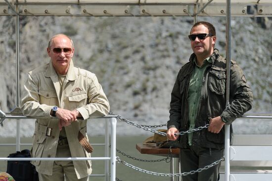 Vladimir Putin and Dmitry Medvedev on holiday