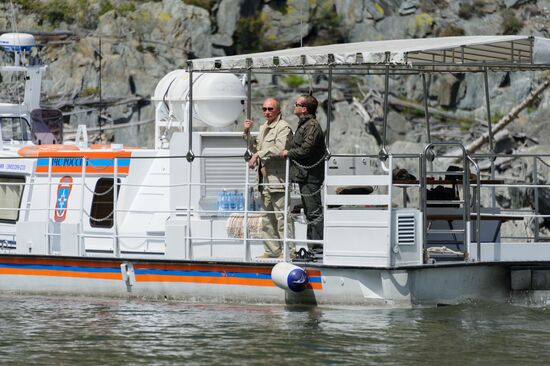 Vladimir Putin and Dmitry Medvedev on holiday