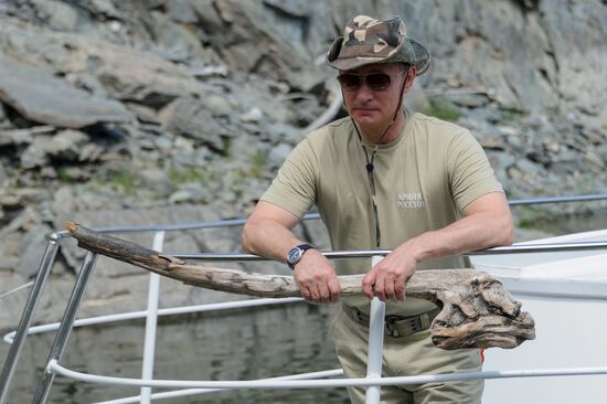 Vladimir Putin and Dmitry Medvedev on holiday