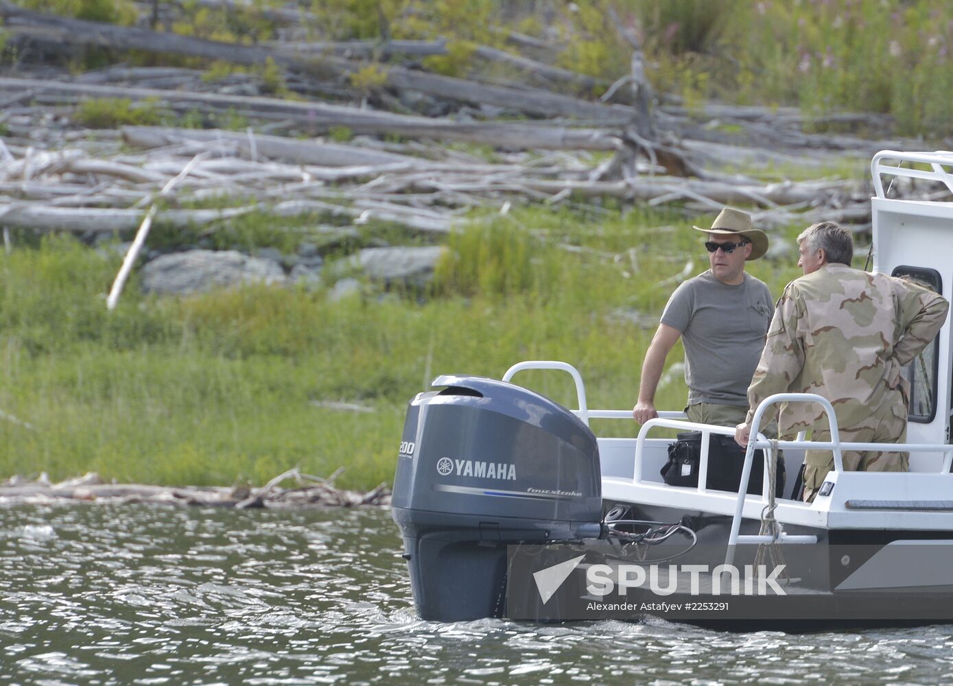 Vladimir Putin and Dmitry Medvedev on holiday