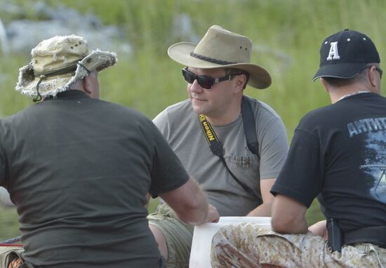 Vladimir Putin and Dmitry Medvedev on holiday