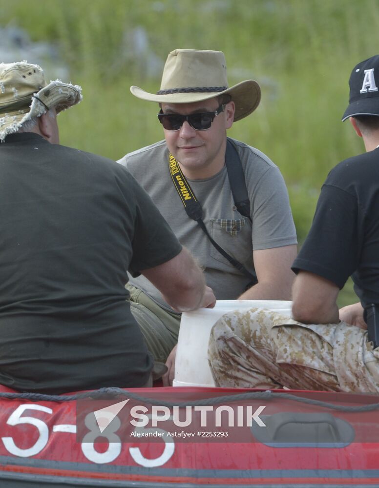 Vladimir Putin and Dmitry Medvedev on holiday