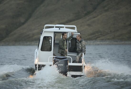 Vladimir Putin and Dmitry Medvedev on holiday