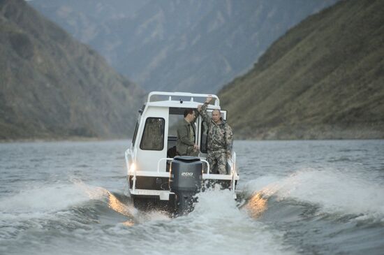Vladimir Putin and Dmitry Medvedev on holiday