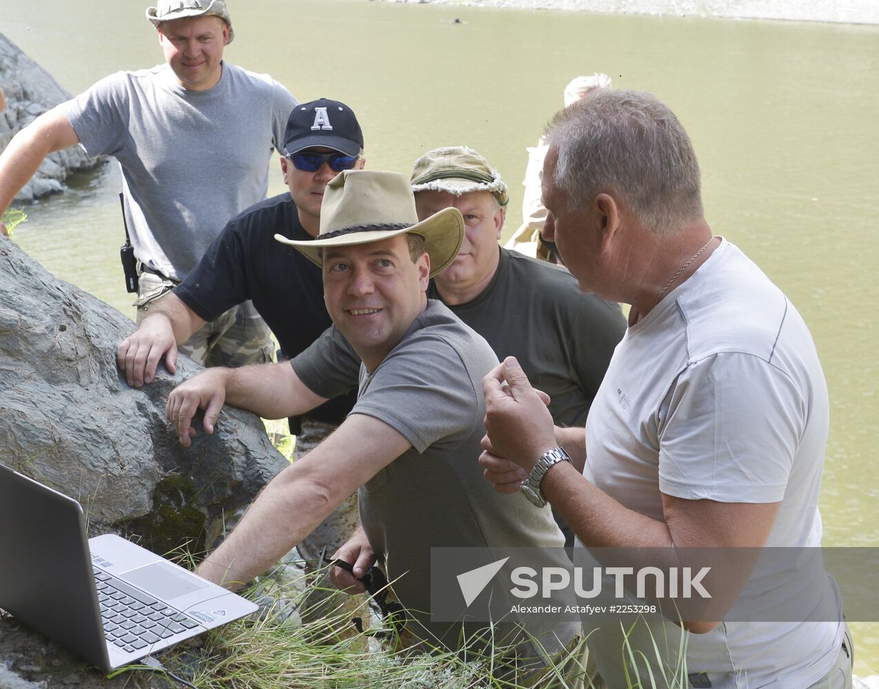 Vladimir Putin and Dmitry Medvedev on holiday