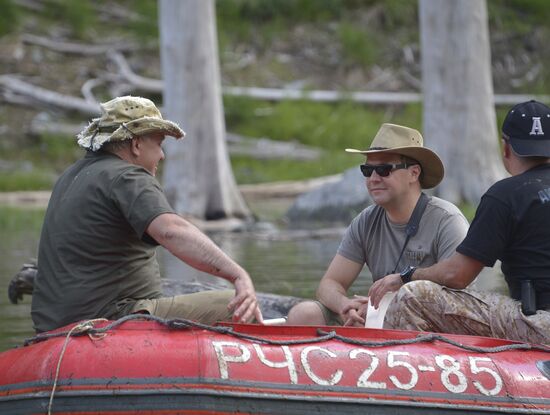 Vladimir Putin and Dmitry Medvedev on holiday